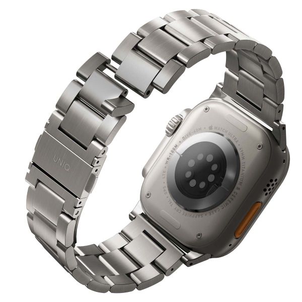 Uniq Bracelet Osta en acier avec maillons auto-ajustables Apple Watch Series 1 t/m 11 / SE / Ultra (44/45/46/49 mm) - Titanium (Silver)