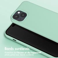 Selencia Coque silicone avec cordon amovible iPhone 15 - Turquoise