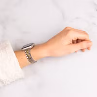 Selencia Bracelet en acier slim style Jubilee Apple Watch Series 1 t/m 9 / SE (38/40/41 mm) | Series 10 / 11 (42 mm) - Argent et Or