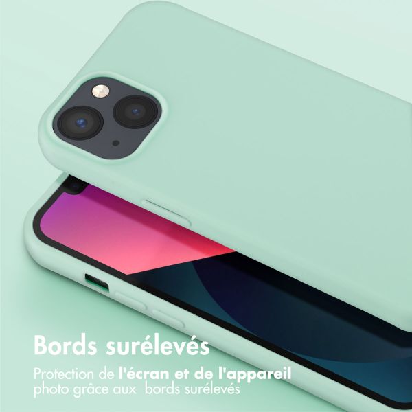 Selencia Coque silicone avec cordon amovible iPhone 13 - Turquoise