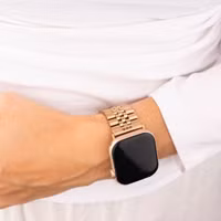 Selencia Bracelet Metallique Jubilee Apple Watch Series 1 t/m 9 / SE (38/40/41 mm) | Series 10 / 11 (42 mm) - Rose Doré