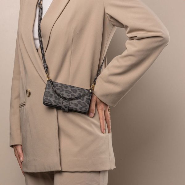 Selencia Étui de télephone portefeuille imprimé léopard Sabi Samsung Galaxy S24 / S25 - Midnight Black