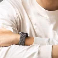 Uniq Bracelet tressé Aspen Designer Edition Apple Watch Series 1 t/m 11 / SE / Ultra (44/45/46/49 mm) - Pebble Grey