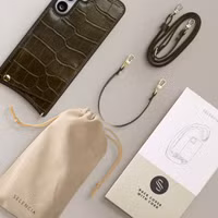 Selencia Coque de télephone Nova Croco avec cordon et porte-cartes Samsung Galaxy S25 FE - Dark Olive