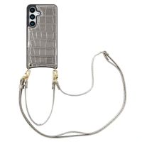 Selencia Coque de télephone Nova Croco avec cordon et porte-cartes Samsung Galaxy S25 - Argent